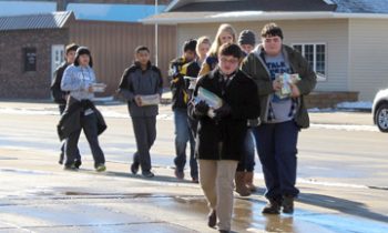 Students Move 9,500 Books from Adrian Branch Library