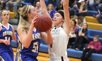 Conference Leader Defeats Adrian Girls